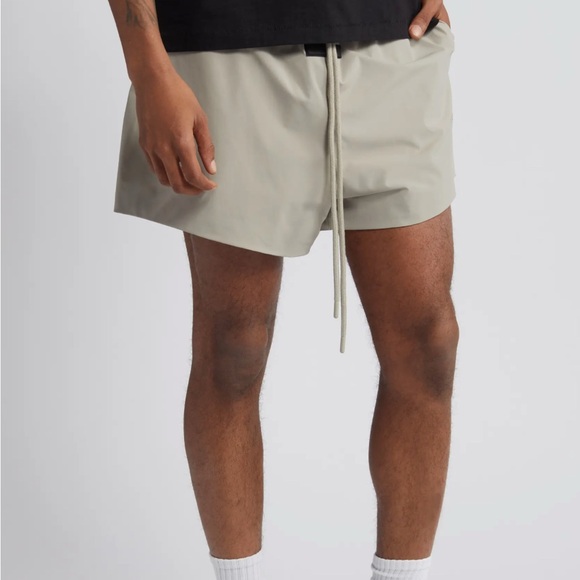 Fear of God Essentials Stretch Nylon Running Shorts
 
Size Medium, SEAL - Picture 7 of 12